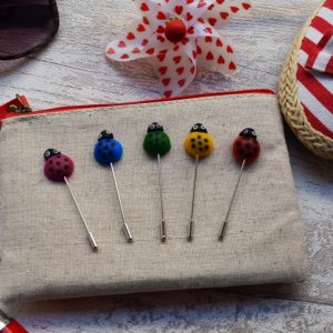 alfiler mariquita boda